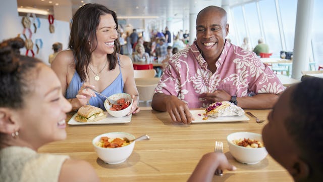 Family enjoying lunch at AquaDome Market onboard Icon of the Seas. Lunch, casual dining, relaxing