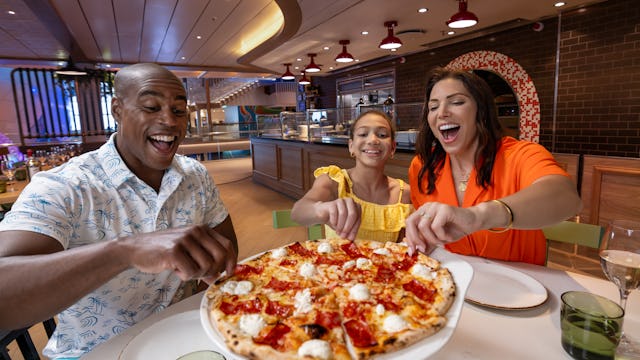 IC, Icon of the Seas, family having pizza at Giovanni's Wine Bar, Italian food, enjoyment, fun.