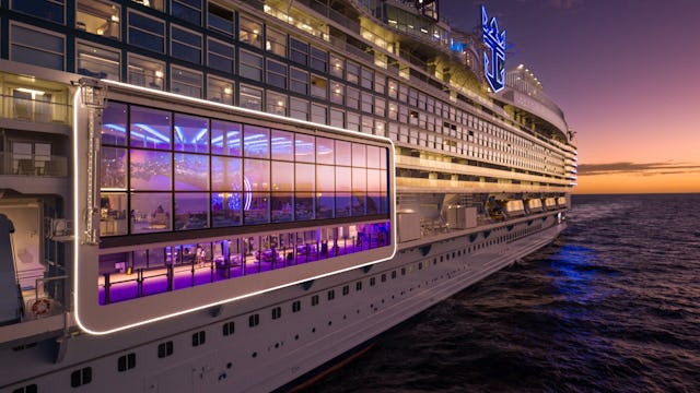 IC, Icon of the Seas, aerials, close-up of port side of ship at angle, view into Pearl Café, perspective, POV looking toward aft, sunset, evening, dusk, orange colors.