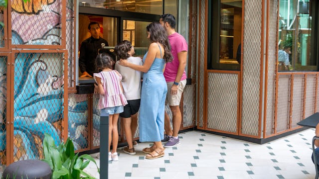 IC, Icon of the Seas, family at Izumi in the Park window, Japanese cuisine, Quick Bites, casual dining,