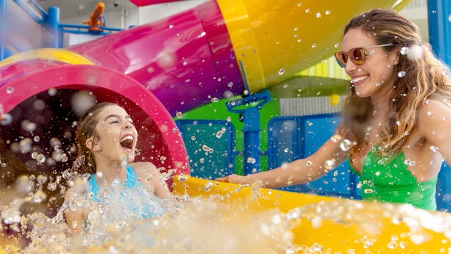Mother and daughter enjoying one of the many waterslides on board of the Icon of the Seas.