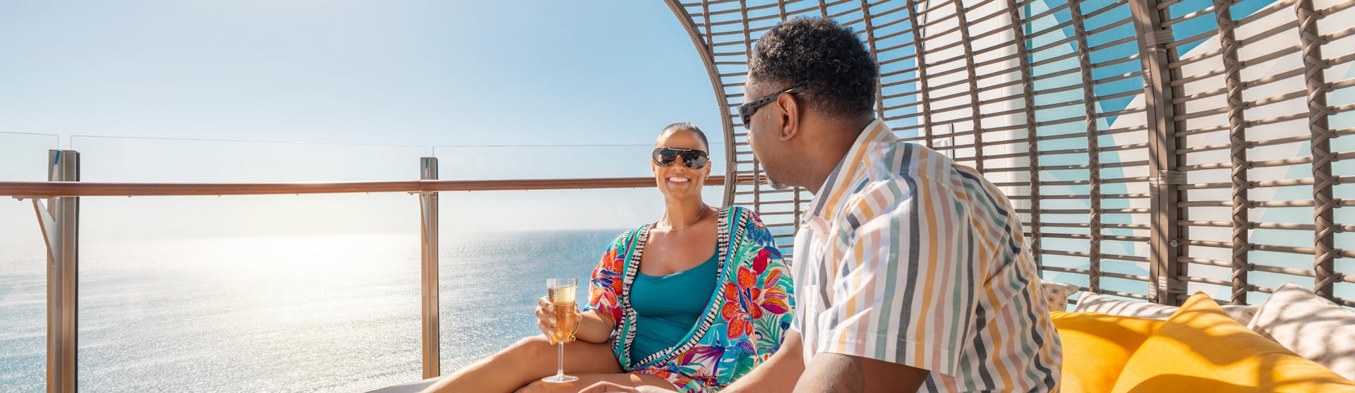 People enjoying some leisure time at the Suite Sun Deck, on board of the Icon of the Seas.