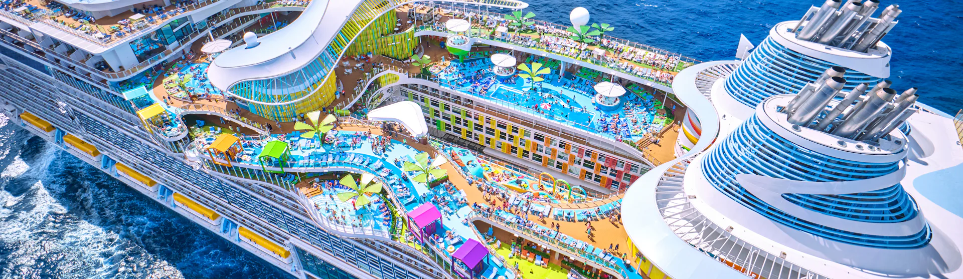 Top view from Icon of the Seas, where all the swimming pools can be seen.